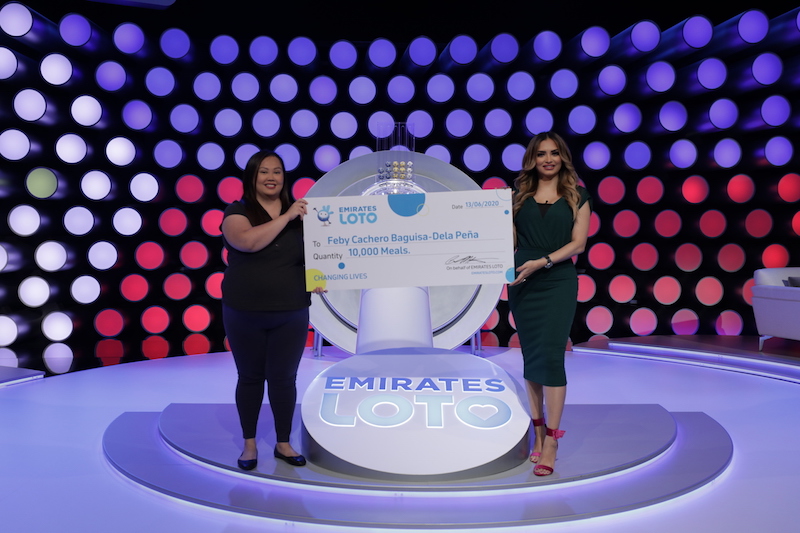 Feby_Cacher_Baguisa-Dela_Pena_and_Aishwarya_Ajit_-_Emirates_Loto_Live_Draw_