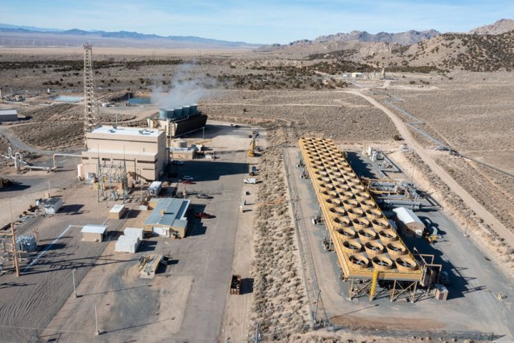 Heat exchangers for the binary geothermal system at the Blundell Geothermal Plant in Utah. At left are the cooling towers of the single-flash unit at the plant and the main generating building. (photo by: Jon G. Fuller/VW Pics/ Universal Images Group via Getty Images)