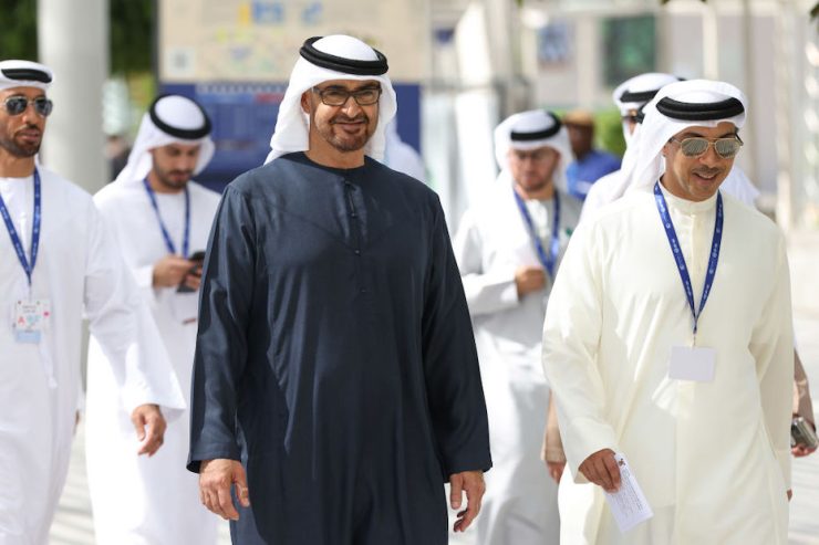 Sheikh Mohammed bin Zayed Al Nahyan, United Arab Emirate's president, left, and Sheikh Mansour bin Zayed Al Nahyan, United Arab Emirates' deputy prime minister, on the opening day of the COP28 climate conference at Expo City in Dubai, United Arab Emirates, on Thursday, Nov. 30, 2023. More than 70,000 politicians, diplomats, campaigners, financiers and business leaders will fly to Dubai to talk about arresting the world’s slide toward environmental catastrophe. Photographer: Hollie Adams/Bloomberg
